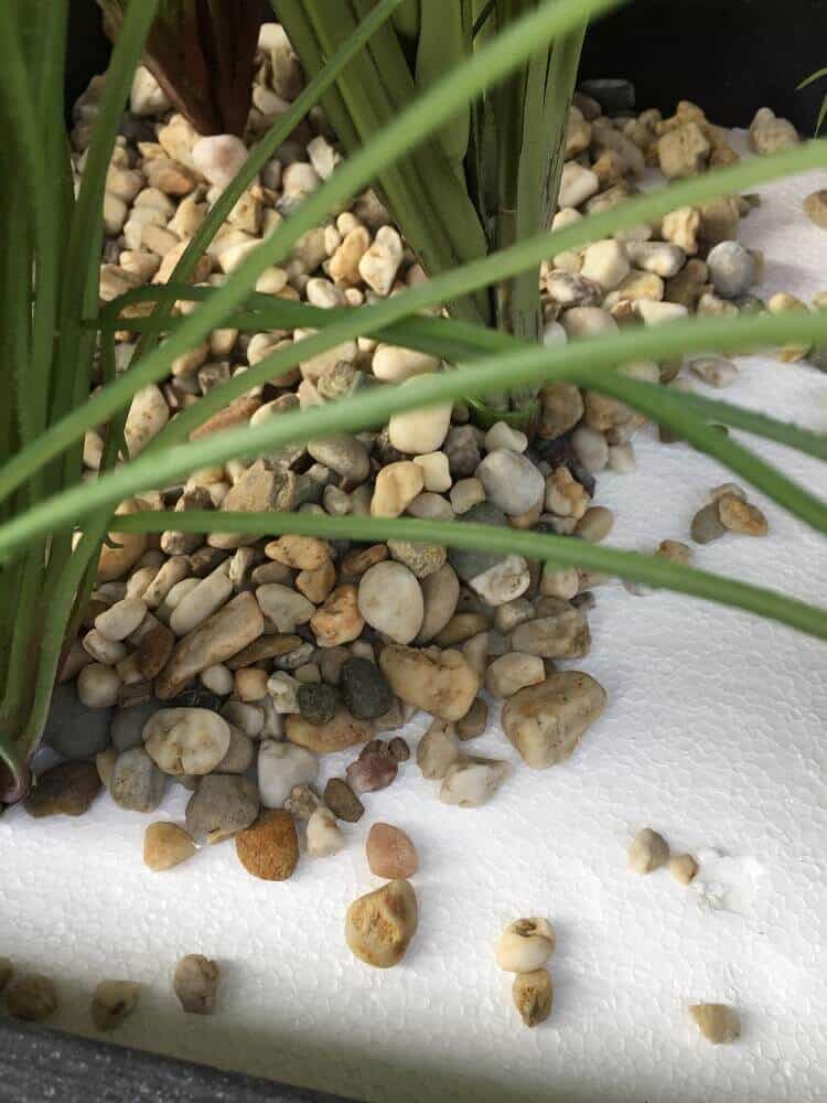 pflanzkübel mit kunstpflanzen und kies verschönern pflanzkübel mit kunstpflanzen und kies verschönern