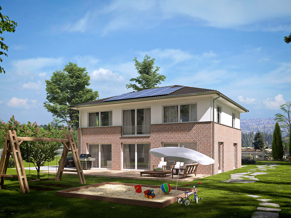 Bei einer Stadtvilla kann man sehr gut unterschiedliche Stile kombinieren - hier trifft Putz auf Klinker